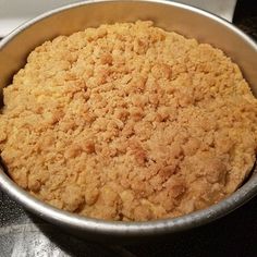 a metal pan filled with food on top of a counter