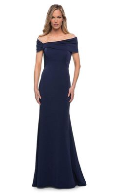 Heighten your elegant appeal with this La Femme 29537 evening dress. This dress highlights a pleated off shoulder neckline supported by short off shoulder sleeves in a fitted bodice with princess seams. The skirt reveals a sheath silhouette while the back shows a mid-open back with back zipper closure to complete the look. Create a perfect evening wearing this elegant La Femme creation. Style: lafemme_29537 Details: Fitted, Short Off Shoulder Sleeves, Pleated Neckline, Princess Seams, Full Lengt Sweetheart Evening Dress, Off Shoulder Neckline, Fitted Lace Dress, Off Shoulder Sleeves, Velvet Sheath Dress, Cutout Gown, Off Shoulder Evening Dress, Couture Evening Dress, Dama Dresses