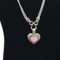 Heart and crystal silver tone necklace by Lia Sophia Elegant Silver Crystal Heart Necklace, Silver Crystal Heart Pendant Jewelry, Elegant Silver Chain Necklace For Valentine's Day, Silver Metal Crystal Necklace With Lobster Clasp, Metal Rhinestone Necklace For Anniversary, Silver Crystal Heart Necklace For Valentine's Day, Silver Pendant Crystal Necklace With Lobster Clasp, Silver Rhinestone Pendant Necklace For Valentine's Day, Silver Chain Necklace With Lobster Clasp For Valentine's Day