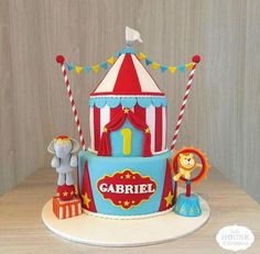 a circus themed birthday cake on a table