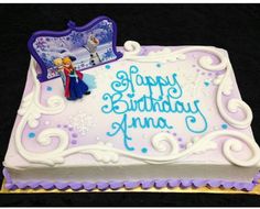 a birthday cake with frosting on it that says happy birthday anny and an image of princess aurora