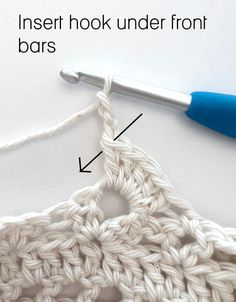 the crochet hook under front bars is shown with an arrow pointing to it