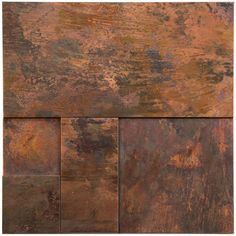 an old, rusty metal plate with different colors and patterns on it's surface