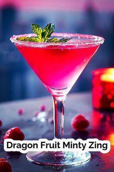 the dragon fruit minty zing cocktail is garnished with fresh mints