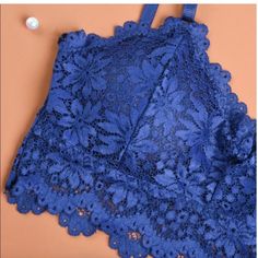 Blue Bralette - New In Package,No Labels Attached. -One Size Fits Most Bra Size 30-36 (A-C). Soft Stretchy Lace, Adjustable Straps, Removable Pads. Seamless, Soft Interior Lining. No Underwire (Wireless) 85% Modal/15% Spandex Item Measures 11” Unstretched, 16” Stretched. Affordable Blue Bra-friendly Intimates, Cheap Wedding Dresses Online, Lace Straps, Seamless Bra, Cheap Wedding Dress, Padded Bras, Private Label, Bra Styles, Lace Bralette