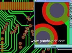 an electronic circuit board with various colored circles on it