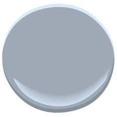 a white paint color is shown in this image, it's light gray and has an oval shape