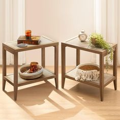 two wooden tables sitting on top of a hard wood floor