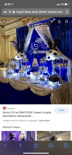 an image of a blue and white table with silver decorations on it, which is being viewed on instagram