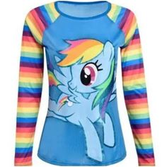 a women's long sleeve shirt with a rainbow pony on it