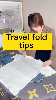 a woman is cutting fabric on top of a bed with the words travel fold tips