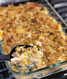 a casserole dish with corn and meat in it