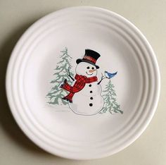 a white bowl with a snowman on it