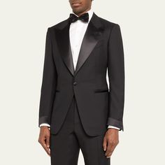 TOM FORD "Shelton" suit in solid twill with tonal satin trim Peak lapels Single-button closure Chest welt pocket Side besom pockets Double-vented back Straight-leg trousers Unfinished hem to be tailored to desired length Wool Lining: Cotton/cupro/silk Made in Italy Classic Custom Fit Tuxedo With Welt Pockets, Tailored Tuxedo For Black-tie Events With Welt Pockets, Lapel Collar Tuxedo With Welt Pockets For Black-tie Events, Semi-formal Tuxedo With Welt Pockets, Classic Groom Suits With Welt Pockets, Timeless Formal Tuxedo With Welt Pockets, Formal Tuxedo With Concealed Placket, Tuxedo With Pressed Crease And Flat Front, Tuxedo For Tailoring With Pressed Crease And Flat Front