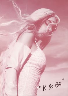 a woman with long blonde hair standing in front of a pink and white sky background