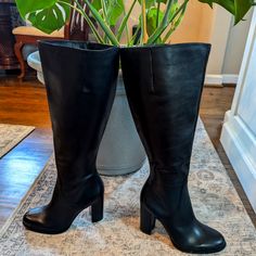 Nwt Sam Edelman Knee High Black Leather Boots. Size 9. Never Worn. Beautiful Smooth Black Leather, Stacked 4 1/2 Inch Heel, Round Toe, Wide Calf 18 Inch Circumference, And Knee High 19 1/2 Inch Tall. Small Flaw In Heel (Pictured). Office Boots With Stacked Heel And Medium Width, Leather Boots With Sculpted Block Heel, Classic High Heel Knee-high Boots, Classic Knee-high Boots With High Heel, Leather Boots With Padded Block Heel, Leather Block Heel Boots For Work, Leather Block Heeled Boots For Work, Wide Calf Block Heel Boots For Formal Occasions, Formal Wide Calf Boots With Block Heel