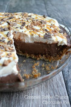 a chocolate pie with white and brown toppings