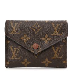 This is an authentic LOUIS VUITTON Monogram Victorine Wallet in Armagnac. This stylish wallet is crafted of traditional Louis Vuitton monogram toile canvas. This wallet features a gold snap closure that opens to a brown crossgrain leather interior with card slots, patchpockets, a bill compartment, and a zipper pocket. Louis Vuitton Wallet, Leather Interior, Authentic Louis Vuitton, Snap Closure, Louis Vuitton Monogram, Patch Pocket, Card Slots, Zipper Pocket, Slots