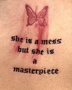 a tattoo with the words she is a mess but she is a masterpiece