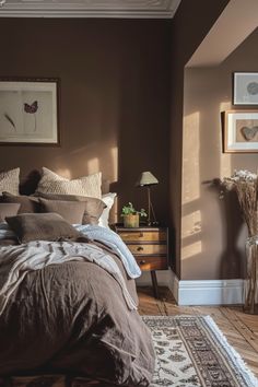 a bed sitting in a bedroom next to a dresser