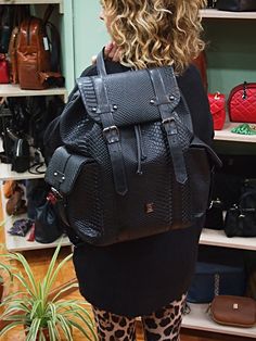 A beautiful large black backpack, handcrafted in high quality Genuine Greek Calf Leather with snake skin style print, distinguished for its minimalist elegance and originality. Measurements: Height 40 x Length 30 x Width 15 cm (15.7 x 11.8 x 5.9 inches, XL Size). This beautiful model is also available in large size. The backpack inside includes a large zipped pocket, as also 2 pockets. Externally you can find 2 pockets sideways. A magnificent bag to keep for decades and love as a unique piece of your everyday style. Please expect your package delivered early: You may receive your bag at 1-2 days after the shipping in EU and 3-4 days in USA. For other countries we can inform you specificly about each country. All of our products are available in various colours, qualities and styles of your Leather Backpack Black, Black Snake Skin, Brand Name Bags, Everyday Backpack, Black Leather Backpack, Black Snake, Leather Conditioner, Large Backpack, Black Backpack