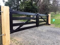 Black timber gate Corrugated Metal Gate, Bamboo Gate, Pebble Pathway, Farm Fence Gate, Farmhouse Gate, Driveway Gate Diy, Farm Gates Entrance, Wood Gates Driveway, Property Gates