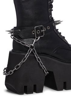 only the strong survive. These combat boots have a vegan leather construction, front lace up closure, removable o-ring belts, spiked detailing, removable chainlink, and cushioned upper. Demonia Boots, Punk Pants, Dark In Love, Goth Boots, Black Punks, Black Combat Boots, Unique Shoes, Junk Drawer, Jelly Sandals