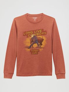 TRUE COWBOY STYLE Perfect for the cooler days, this boy’s long-sleeve cowboy graphic t-shirt will add some western authenticity to his everyday rotation. This long-sleeve t-shirt taps into the cowboy’s way of life and its crafted from a soft cotton blend that’s light enough to wear all season long. Wrangler Western Wear Logo, Cowboy Graphic, The Cowboy, This Boy, Cowboy Style, Wrangler Jeans, Boys Long Sleeve, Way Of Life, Graphic T Shirt