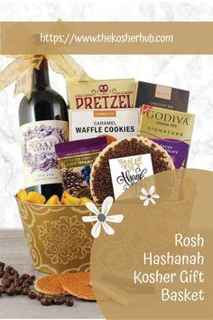 a gift basket filled with wine, cookies and other items for someone's special occasion