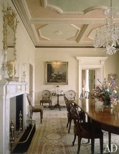 the dining room is clean and ready for guests to enjoy it's own fireplace