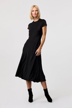 Soft, sleek, and effortlessly elegant, the Luciana black silk dress is the perfect choice for almost any occasion. This short sleeve dress is cut on the bias, allowing the silky satin fabric to drape beautifully for a flattering silhouette. Ideal for layering with knits, jackets, or coats, this midi dress transitions seamlessly from day to night, offering timeless style and sophistication for any setting. Satin Black Dress, Black Silk Midi Dress, Midi Dres, Perfect Fall Outfit, Black Silk Dress, Tie Front Dress, Casual Day Dresses, Black Satin Dress, Evening Gowns Elegant