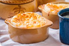 some food is in bowls on a table