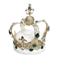 a gold crown with green jewels and white fur on the bottom, sitting in front of a white background