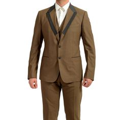 Dolce & Gabbana Men's Beige Wool Three Piece Two Button Suit Us 36 It 46 Country/Region Of Manufacture: Italy Retail Value: $2795.00 This Is Authentic Dolce & Gabbana Men's Beige Wool Three Piece Two Button Suit Sku: Bb-Wh-5465 Model: G1iaet G9x56 M0209 Material: 97% Wool 3% Spandex Fly Type: Zip Chest: 18" Sleeves: 25.5" Shoulders: 16.75" Length: 27.75" Chest (Vest): 18" Length (Vest): 22.5" Waist: 32" Rise: 10" Inseam: Unhemmed Leg Opening: 6.75" Designer Single Button Fitted Suit, Designer Fitted Single Button Suit, Formal Slim Fit Brown Sets, Designer Business Suits, Chest Vest, Dolce And Gabbana Suits, Blue Martini, Slim Suit, Three Piece Suit