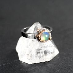 Opal ring, sterling silver ring, stacking ring, multistone ring, mixed metal ring, Rachel Wilder Fine Jewelry Green Opal Ring, Fine Jewelry Rings With Ethiopian Opal Birthstone, Fine Jewelry Ethiopian Opal Birthstone Rings, Opal Ring With Bezel Setting, Modern Opal Ring With Bezel Setting, Fine Jewelry Opal Promise Ring With Polished Finish, Polished Opal Promise Ring, Silver Multi-stone Opal Ring For Promise, Silver Moonstone Ring With Ethiopian Opal