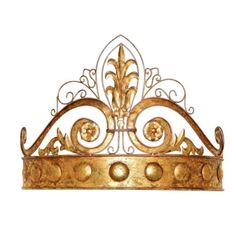 a gold crown with ornate designs on it