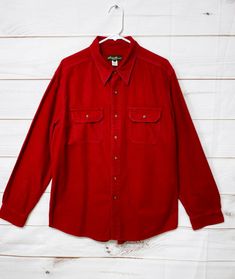 Eddie Bauer Mens Flannel Shirt Size L Red Button Up Long Sleeve 100% Cotton Measurements: (approximate laying flat)   Length (shoulder to hem): 30 in Underarm to Underarm: 25.5 in         Sleeves Length: 27 in Condition: Gently pre-owned no holes, rips or stains Classic Red Flannel Shirt With Pockets, Red Cotton Tops With Snap Buttons, Red Cotton Flannel Shirt With Pockets, Mens Fashion Jeans, Mens Flannel Shirt, Mens Flannel, Button Up Long Sleeve, Red Button, Eddie Bauer