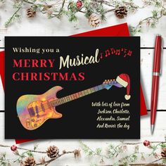 a christmas card with an image of a guitar on it and the words wishing you a merry musical christmas