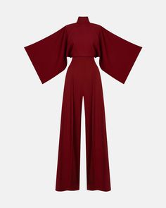 IO Jumpsuit features an exaggerated wide leg, pleat front detail and a high waist perfectly balanced out with traditionally tailored Kimono style sleeves and a high neck with 3 button closures at the back of the neck and an elegant open back.