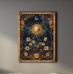 the sun and moon are depicted in an ornate painting on a wall above a bed