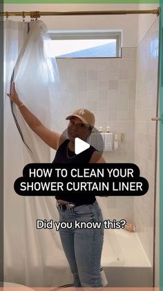 a woman standing in front of a shower curtain with the words how to clean your shower curtain liner did you know this?