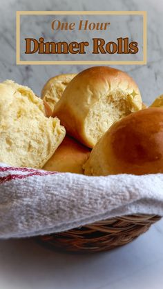 bread rolls in a basket with the words one hour dinner rolls on it's side