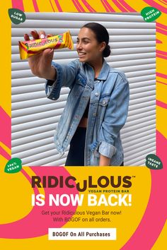 a woman holding up a sandwich in front of a window with the words ridigious is now back on it