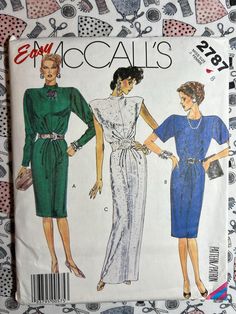 two women's dresses, one in blue and the other in green