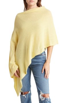 A soft, wool blend poncho with a drapey cowl neckline and a high/low hem is perfect for keeping warm and cozy on a cold day. 22" front length, 33" back length (size OS) Cowl neck Slips on over head 60% lambswool, 20% nylon, 20% angora Dry clean Imported Model stats: 5'10", 32" bust, 25" waist, 36" hip. Model is wearing size OS. Cowl Neck Poncho, Butter Popcorn, Cowl Neckline, Swimwear Cover Ups, Soft Wool, High Low Hem, Cold Day, Keep Warm, Cowl Neck