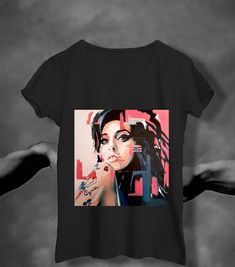 Amy Winehouse T-Shirt, Tribute Sweatshirt, Vintage Shirt, Shirts for women, Shirts for men, Unisex Tee, Graphic tees, Graphic Tee Shirt 70s   HOW TO ORDER  ---------------------------------------- 1-) Please check all photos for details 2-) Choose Your apparel size from the Drop-Down lists next to the item picture. 3-) Choose Your apparel colors according to your taste on the next slide. *For this reason, we suggest that you double-check the color name according to the type of apparel listed in our photo listing if you want the exact color you want. i.e Banana Cream Color for Women's Racerback, not Daisy/Gold color. 4-) Click add to cart. You can go back to add more product 5-) Click "Proceed to check out" 6-) When you check out.  ATTENTION  ---------------------------------------- ⚠️PLEAS Amy Winehouse T Shirt, Amy Winehouse, Graphic Tee Shirts, Color Names, Vintage Shirts, Tee Shirts, Graphic Tees, Mens Shirts, Tops & Tees