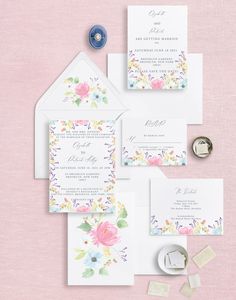 the wedding stationery is laid out and ready to be used