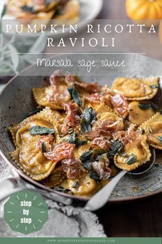 pumpkin ricotta ravioli with spinach sauce in a skillet on a wooden table