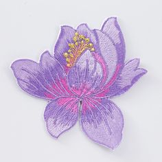 a purple flower with a gold crown on it