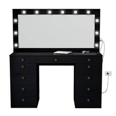 a black vanity with lights on it and a mirror over the top that is turned on